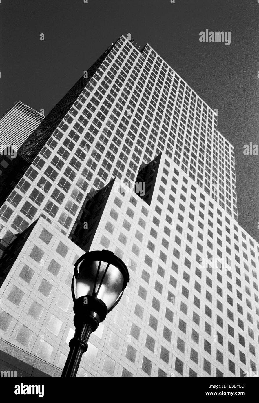 Glass office building with street lamp black & white Stock Photo