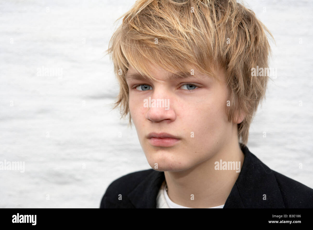 Portrait of teenage boy looking at camera Stock Photo - Alamy