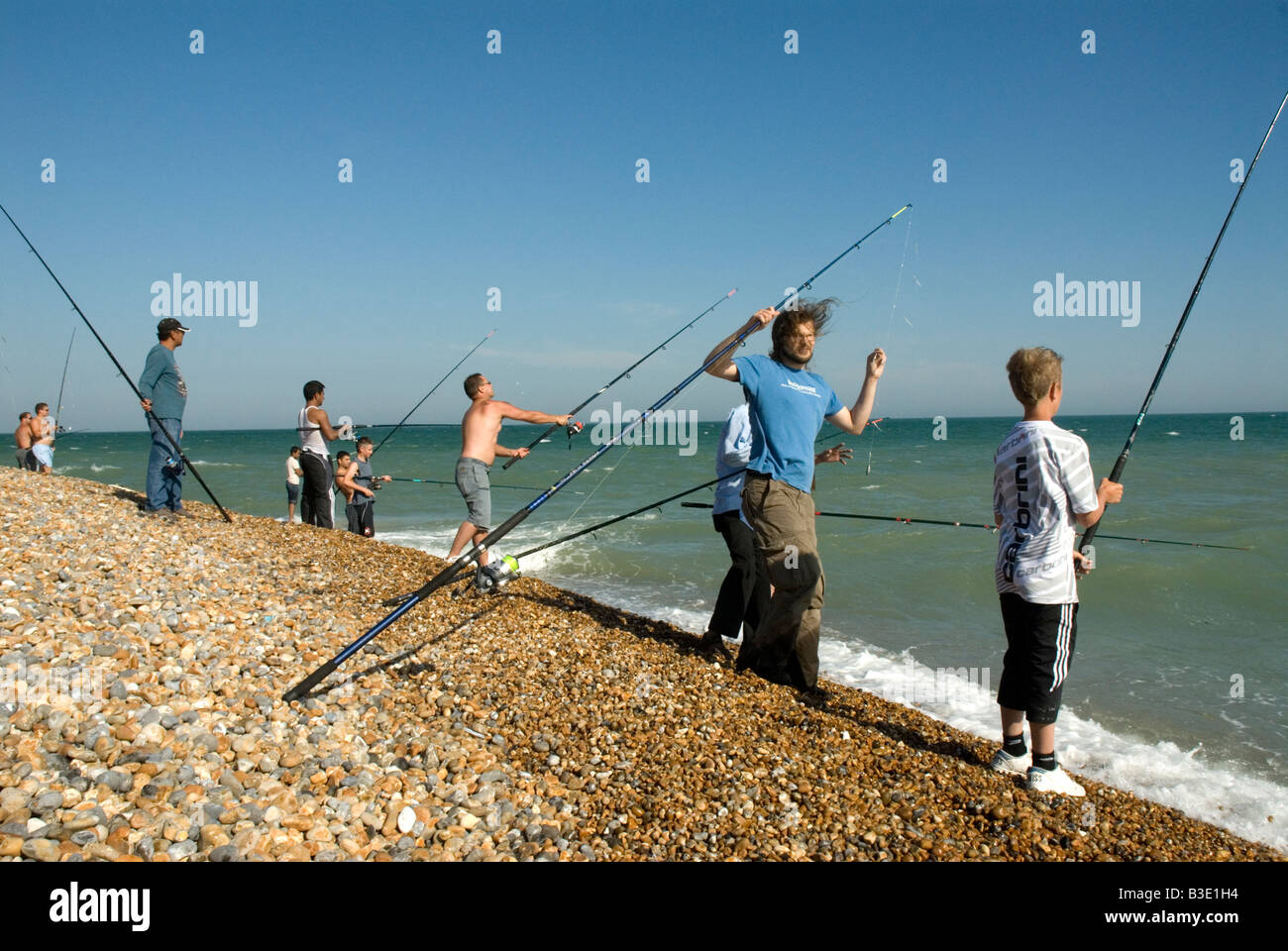 Beach fishing for mackerel Hastings East Sussex UK Stock Photo - Alamy
