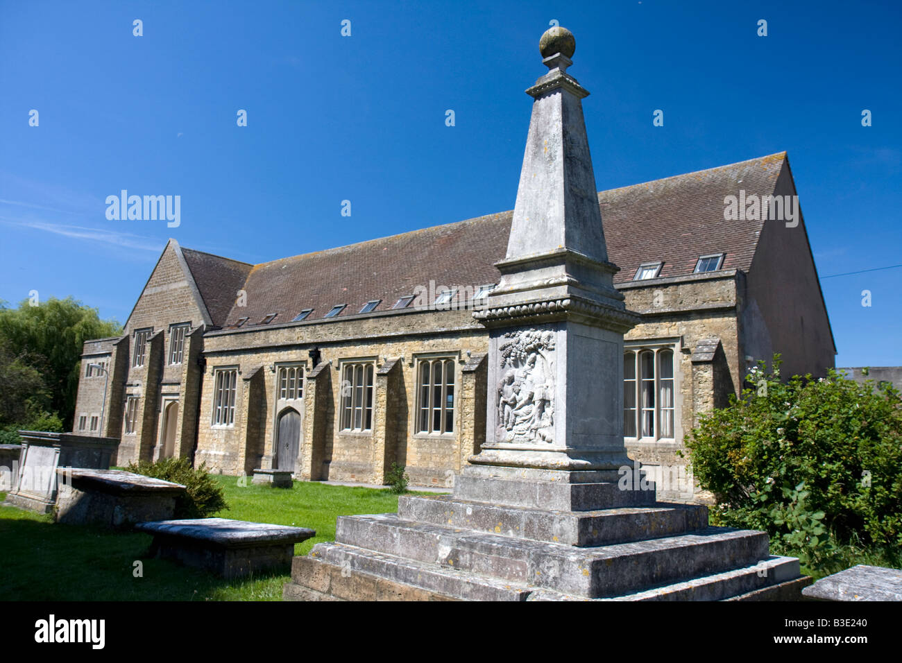 St Mary's Church House and war memorial, Bridport, Dorset Stock Photo