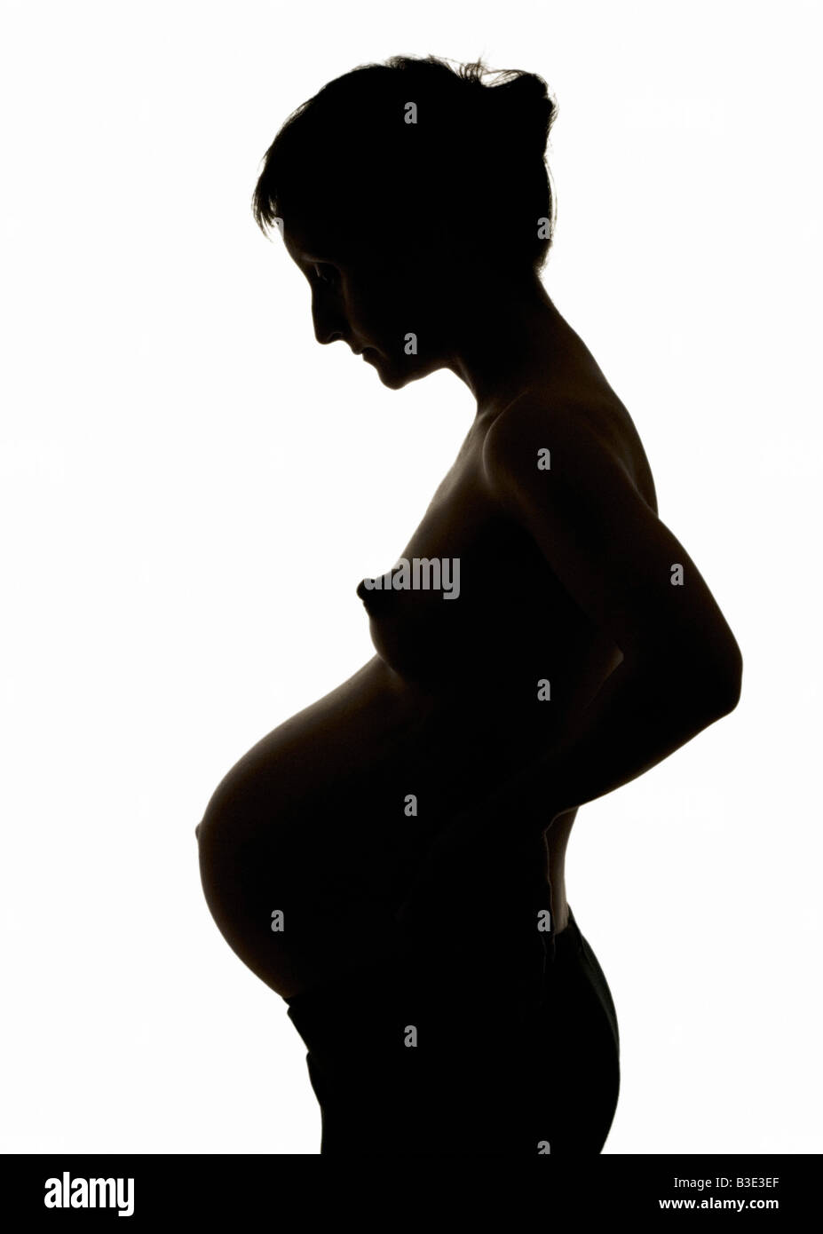 PREGNANT WOMAN BELLY PORTRAIT Stock Photo