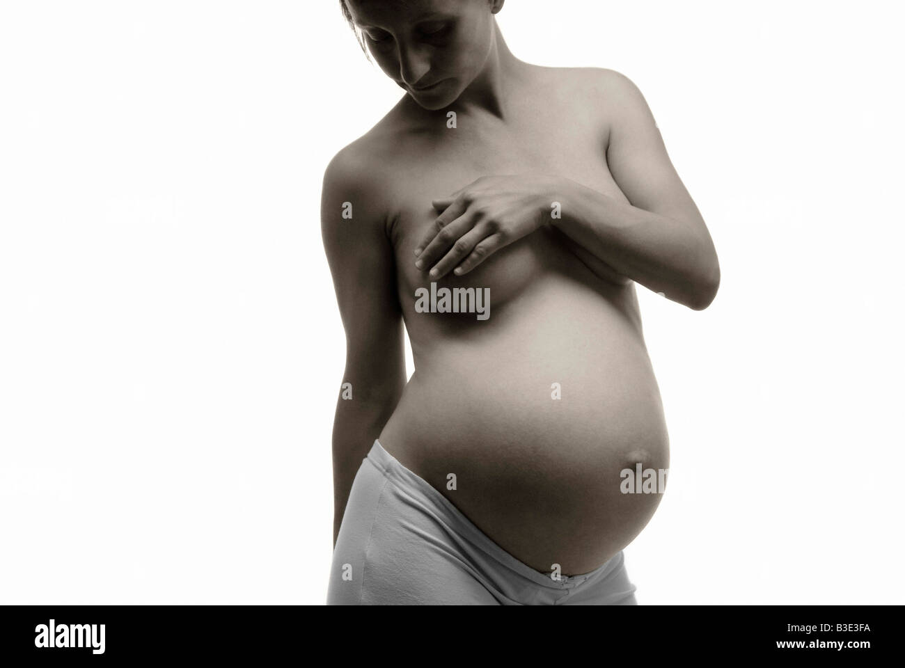 PREGNANT WOMAN BELLY PORTRAIT Stock Photo