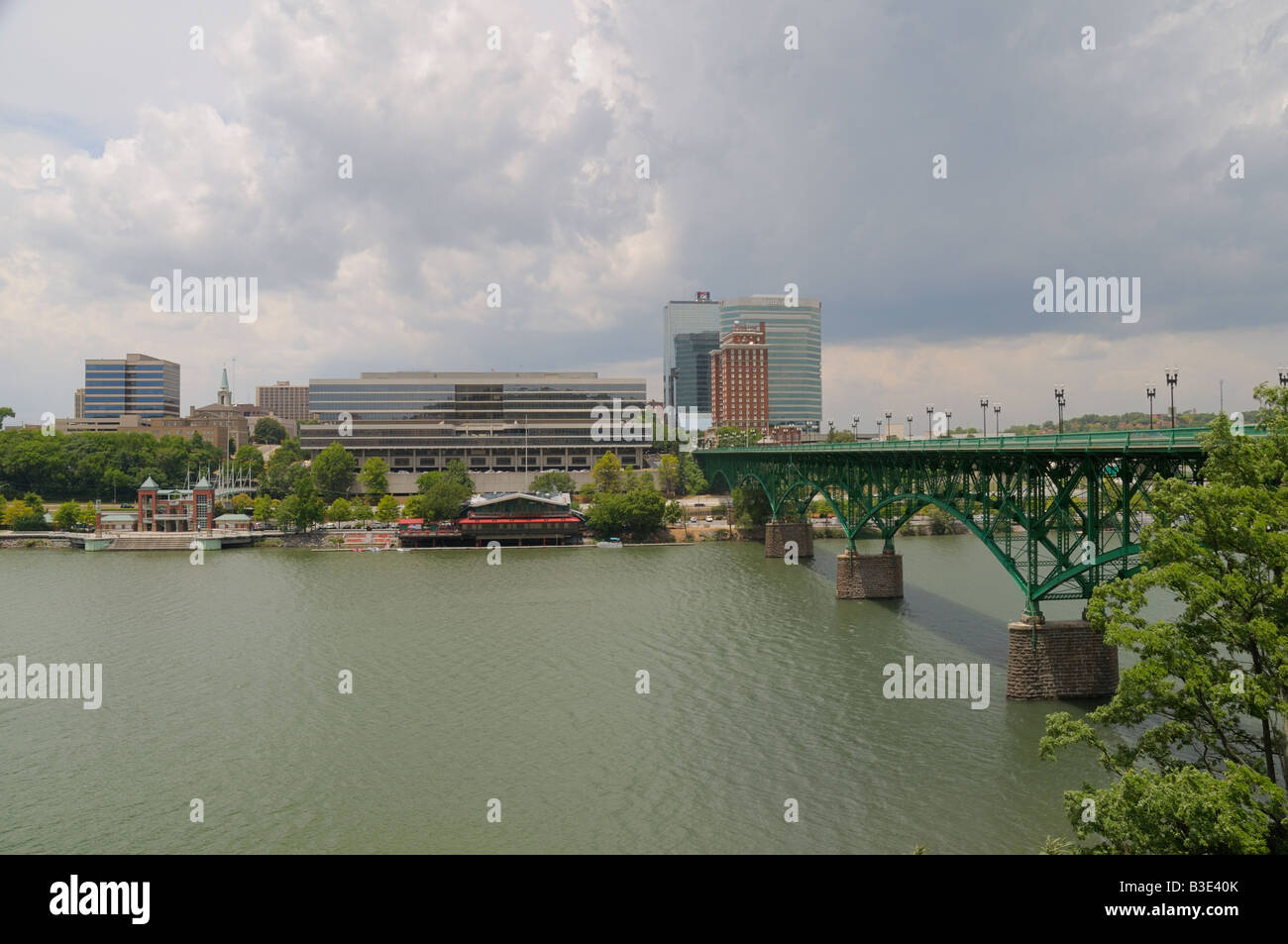 The Tennessee River flows under the Gay Street Bridge with the city of Knoxville Tennessee USA in the background. Stock Photo