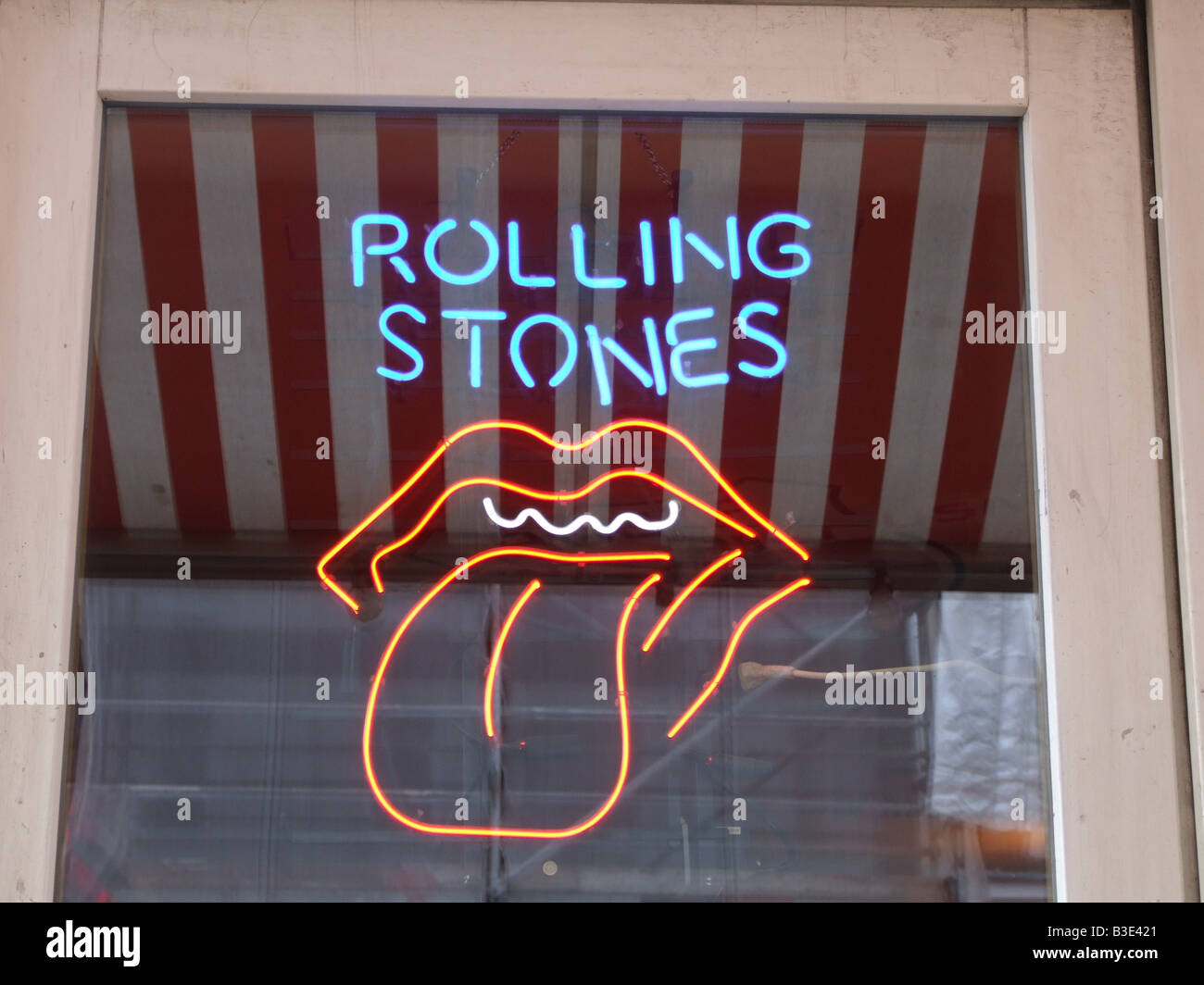 illuminated rolling stones neon sign shop window Stock Photo Alamy