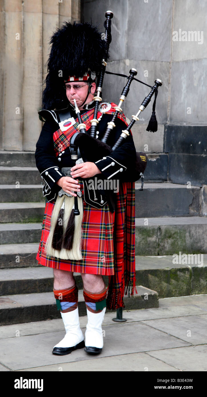 Typical bagpipes player in Edinburgh Stock Photo