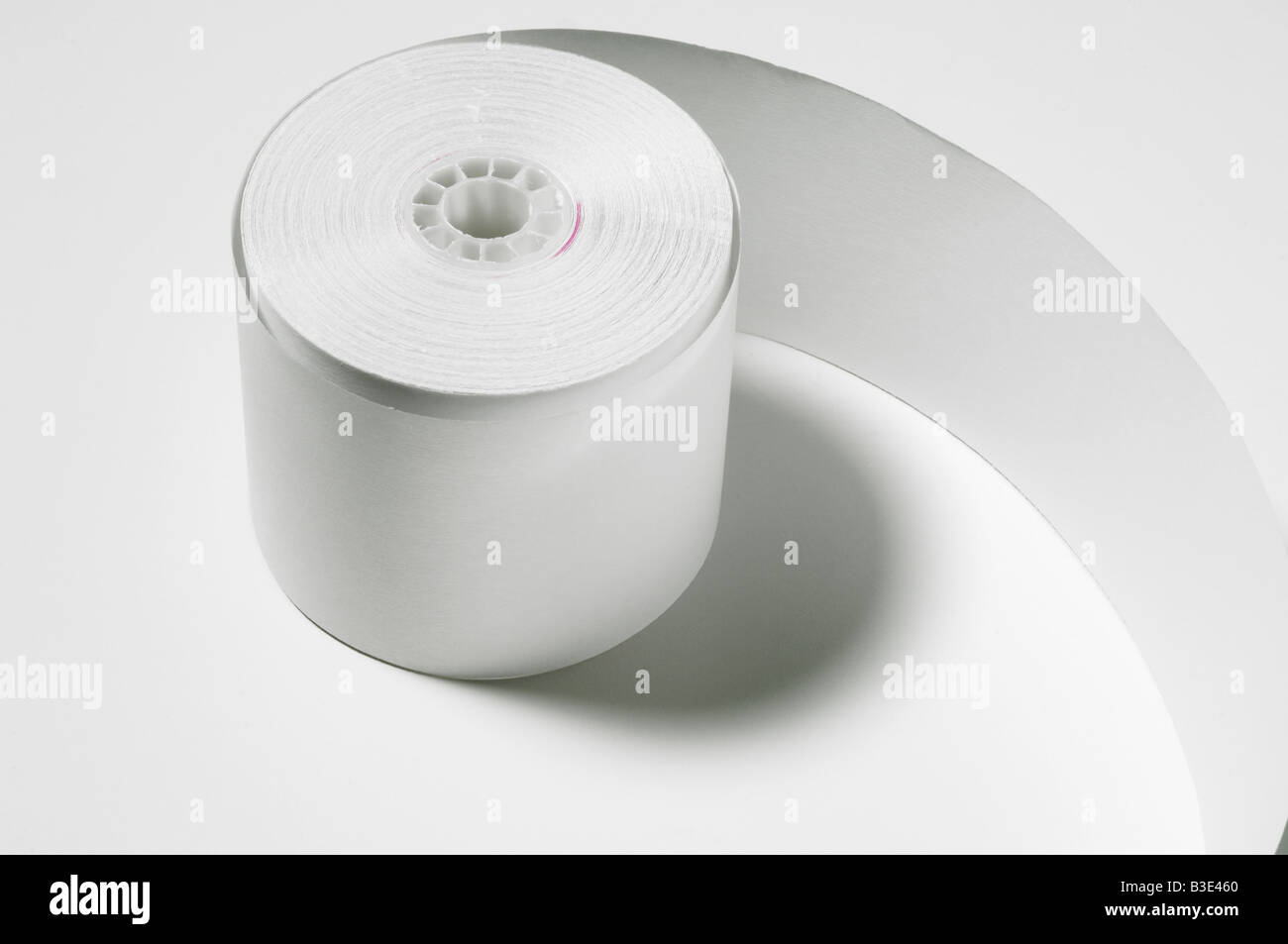A roll of white adding machine paper Stock Photo