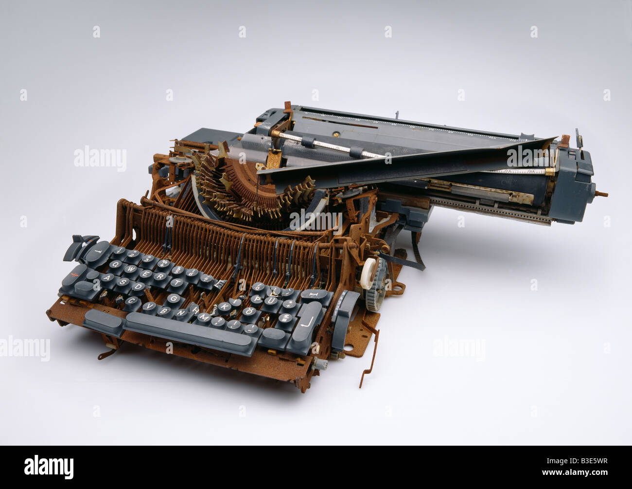 old crashed electric typewriter alte elektrische Schreibmaschine Schrott Stock Photo
