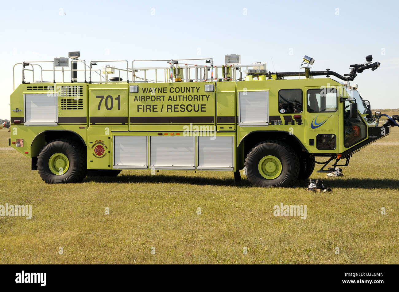 A Wayne County , Michigan Airport's Fire Department's Crash Truck on standby at Willow Run Airport in Bellville, Michigan Stock Photo