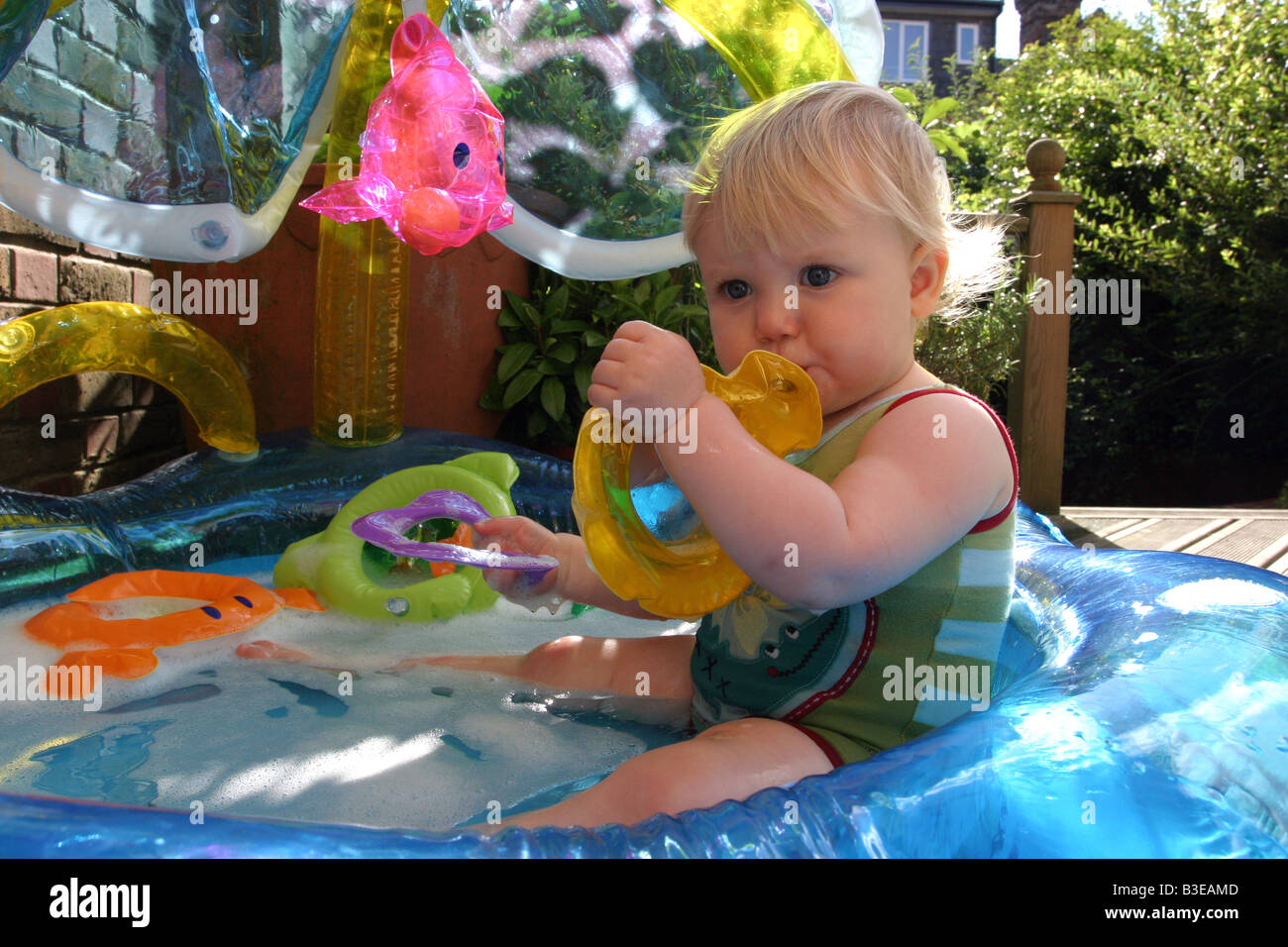 Baby in Paddling Pool Stock Photo Alamy