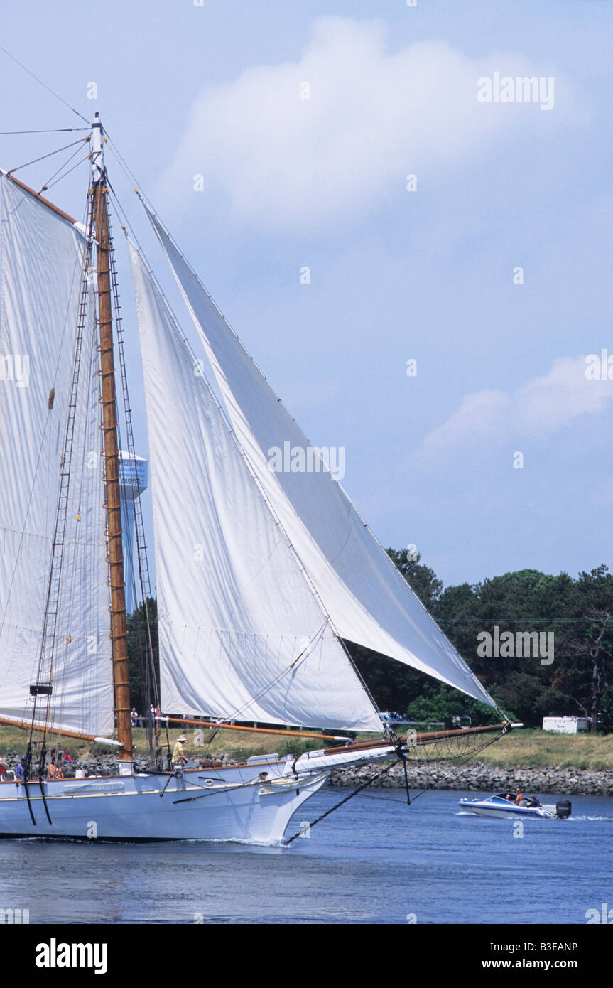 White schooner bow under sail going through Cape Cod Canal Stock Photo