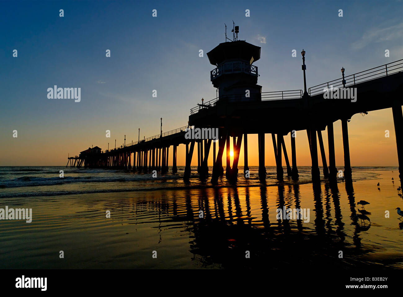 Huntington Beach Pier at sunset Stock Photo