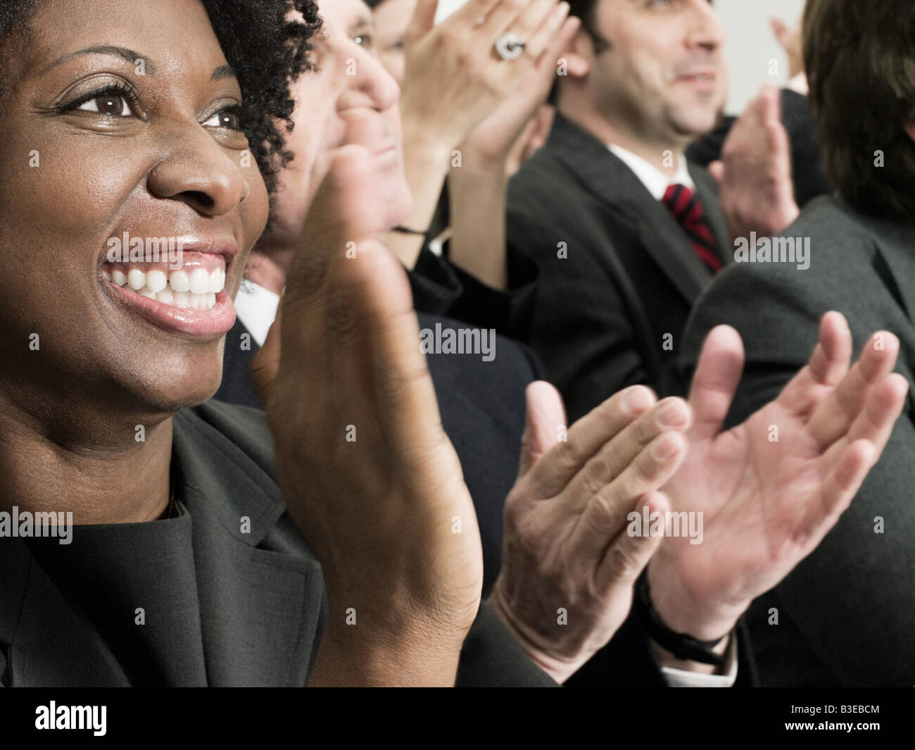 Clapping african american woman hi-res stock photography and images - Alamy