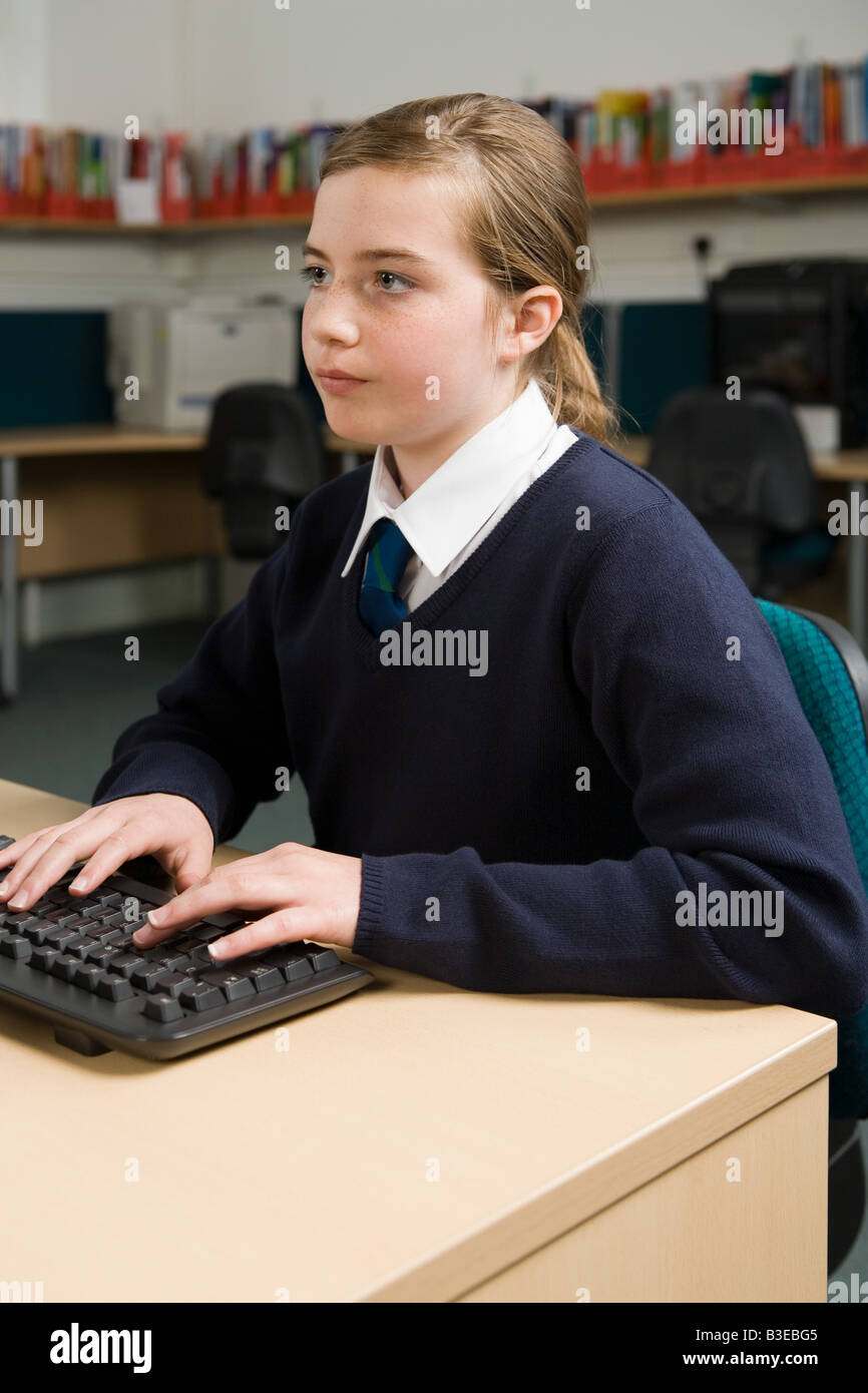 Girl using computer Stock Photo - Alamy