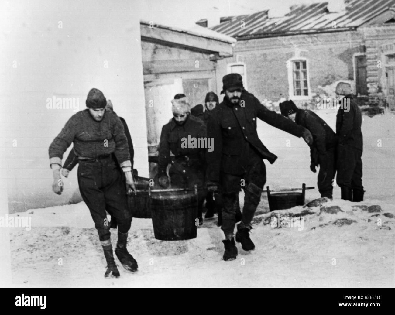 German POWs carrying food, Russia / WWII Stock Photo