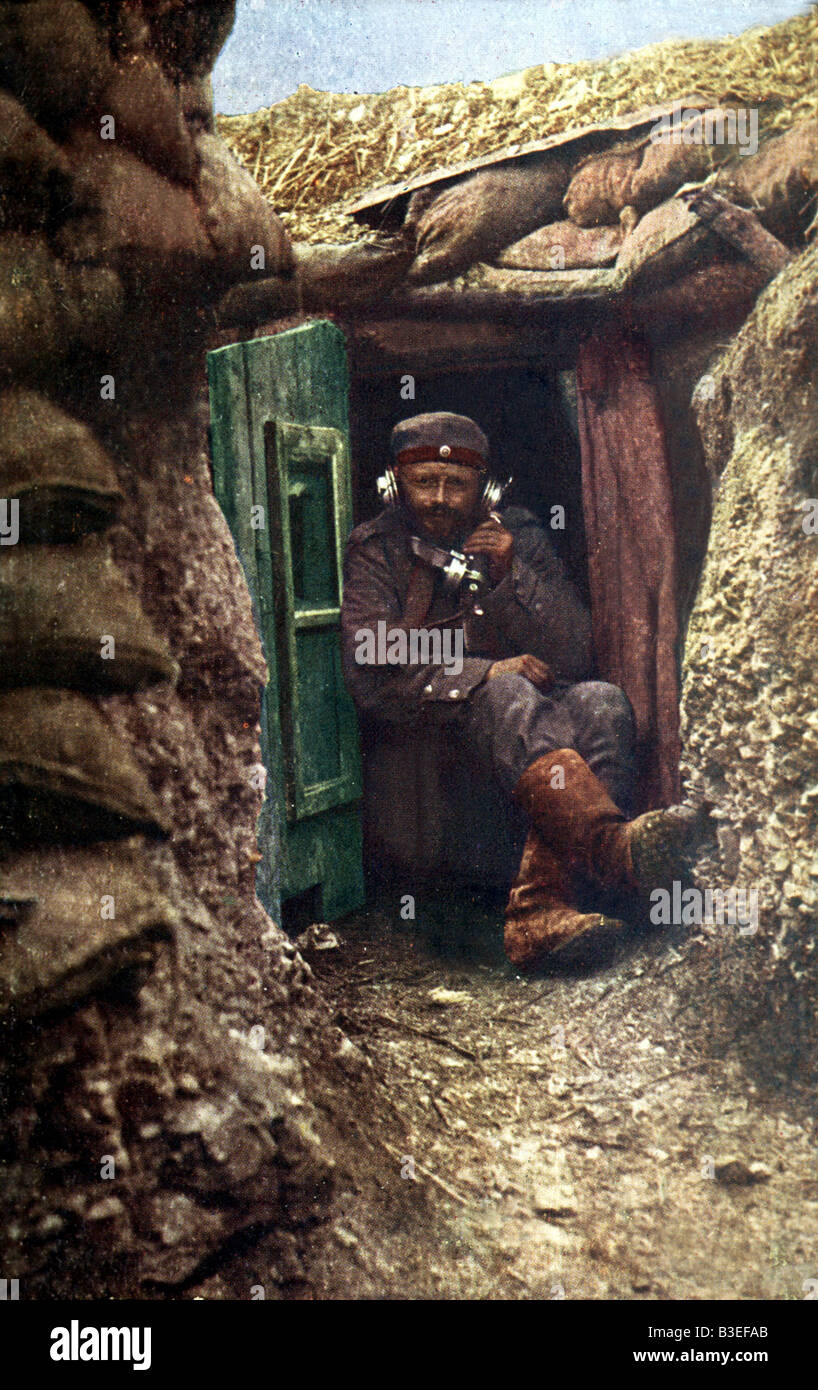 events, First World War / WWI, Western Front, German soldier with field telephone in a trench, photo postcard, Germany, 1915, Stock Photo