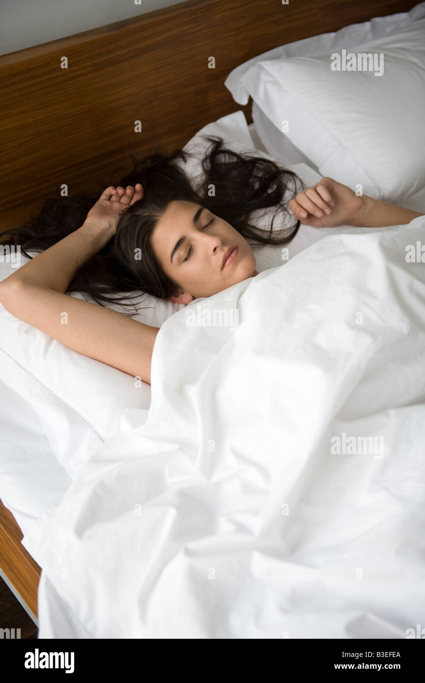 Young woman sleeping Stock Photo - Alamy