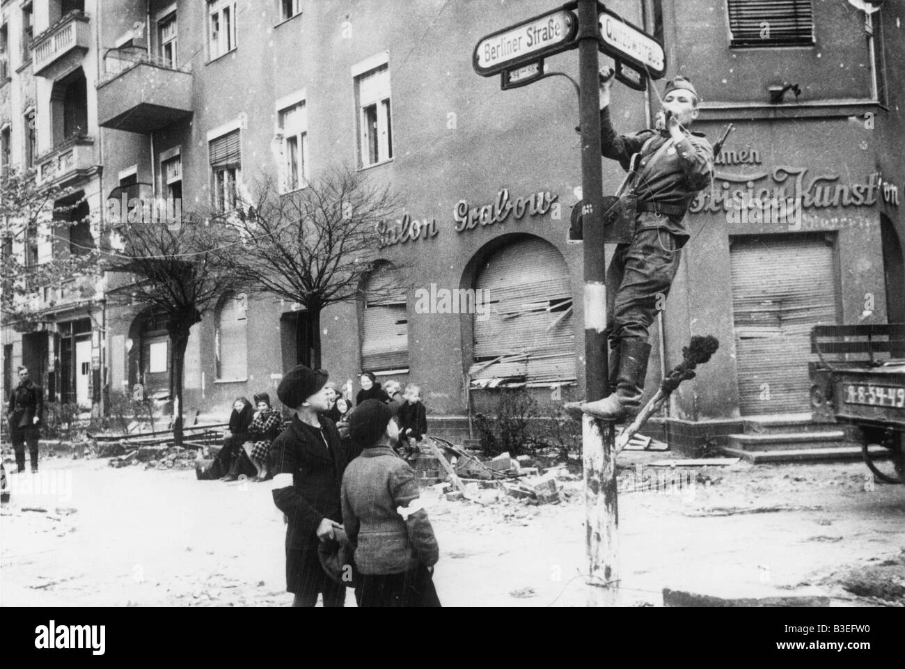 Soviet soldier & children/ Berlin/ 1945 Stock Photo