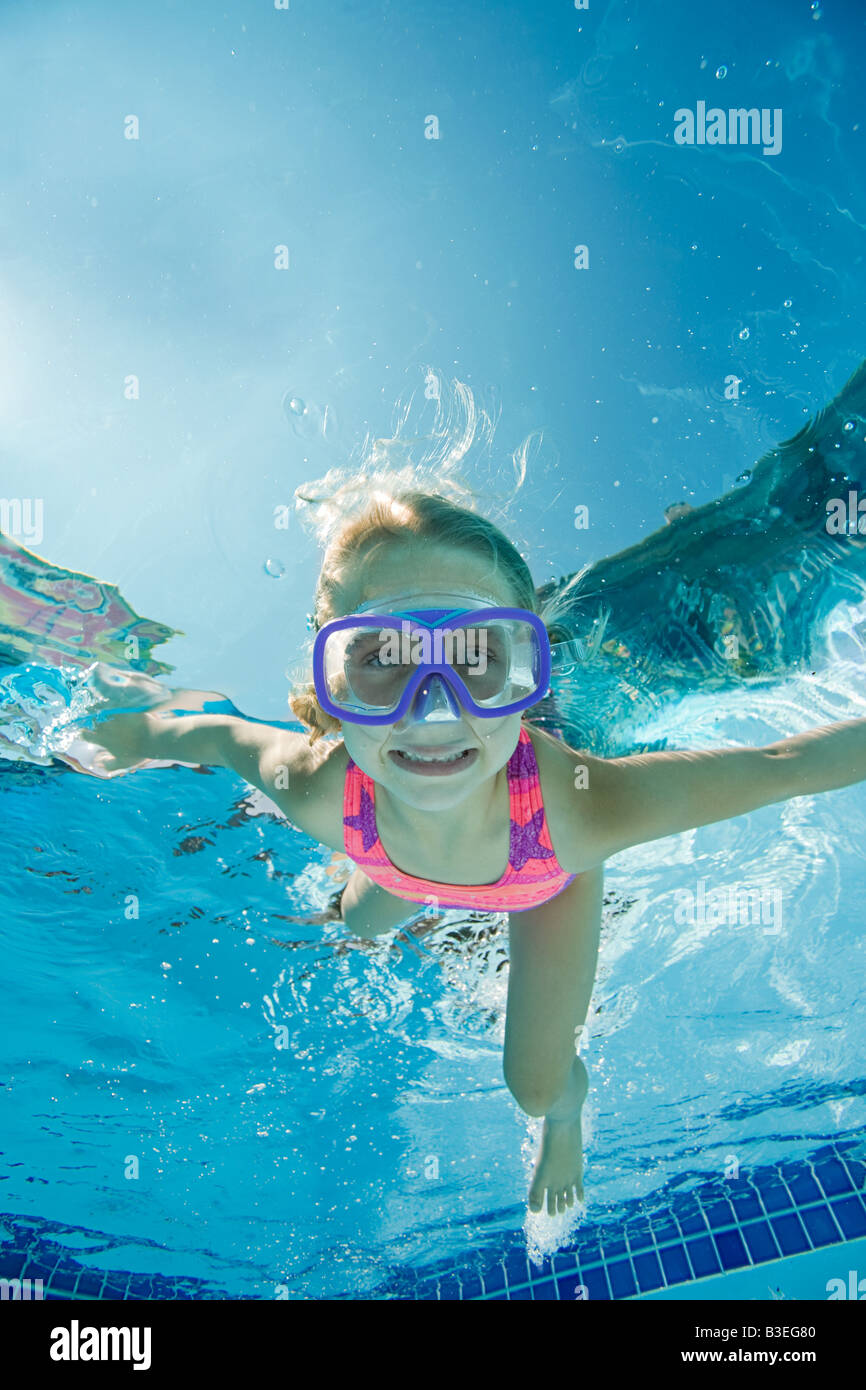 Girl in swimming pool Stock Photo - Alamy