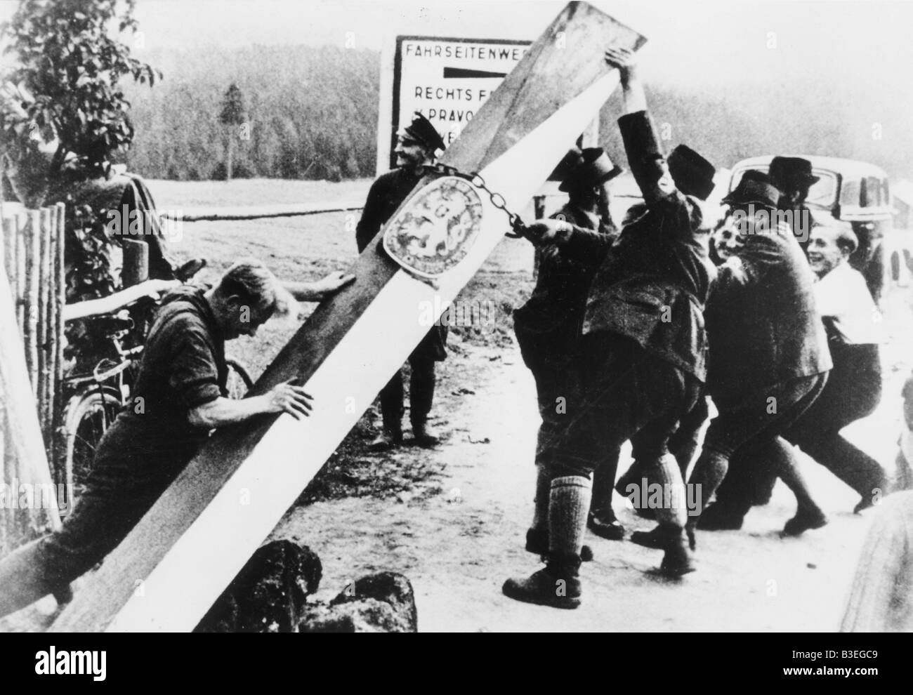 Sudeten Germans tear down border barrier Stock Photo