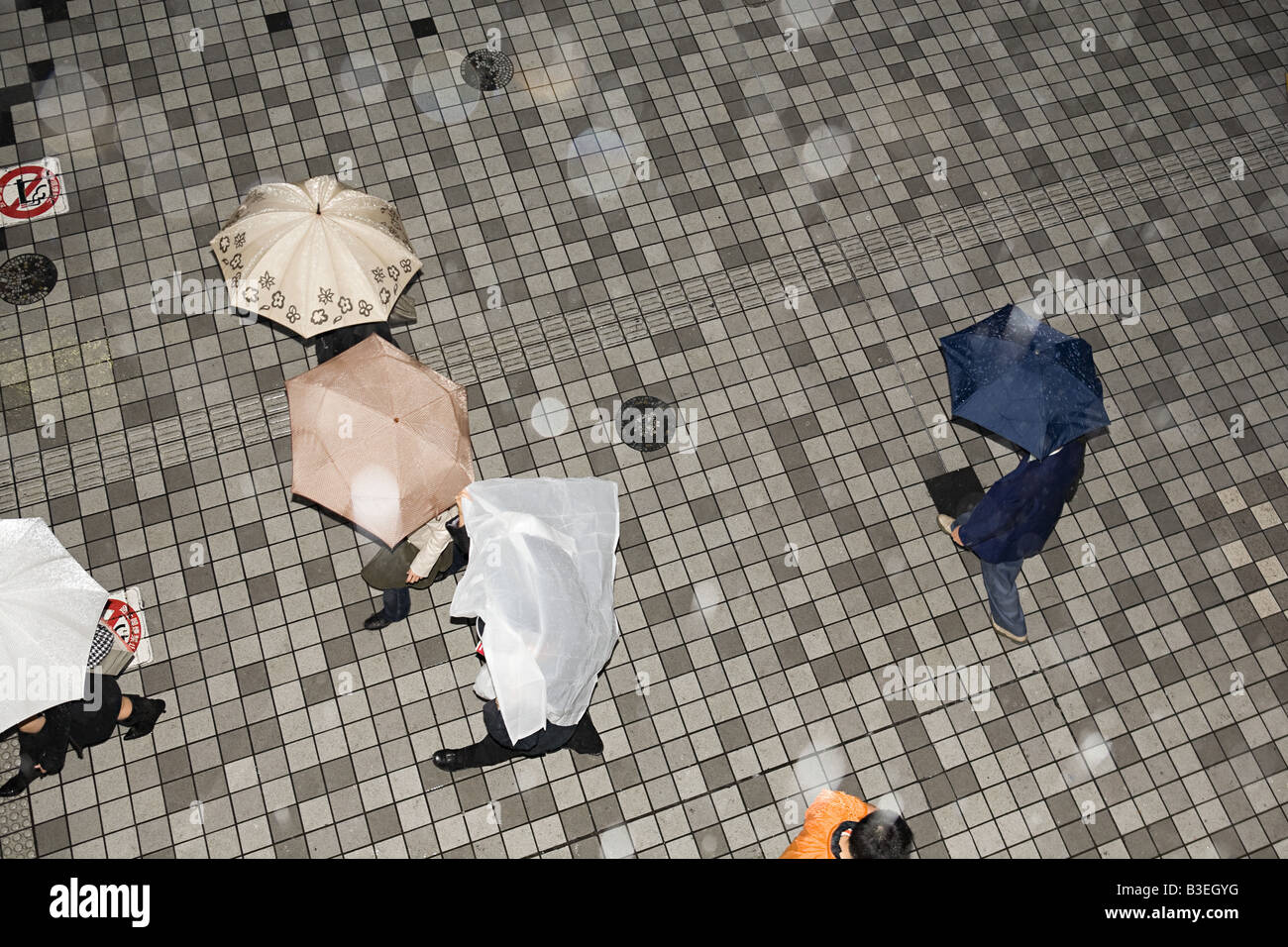 People with umbrellas Stock Photo