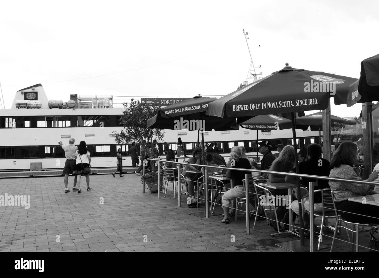 Tourists boats and restaurant along Queen's Quay Terminal in Toronto Harbour Stock Photo