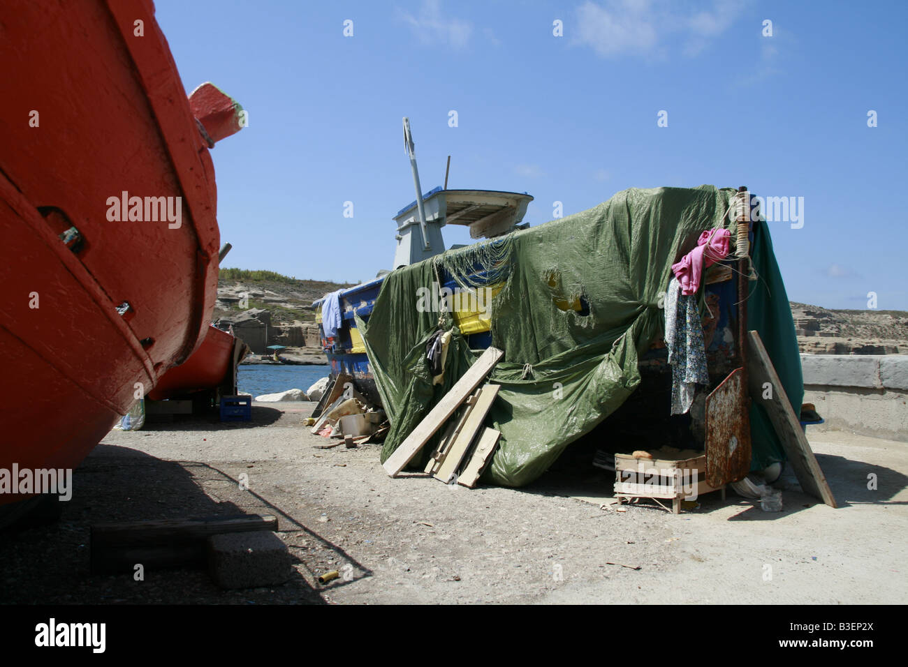 Plastic sheet fishing boat cover tarpaulin old dirty ship hi-res stock  photography and images - Alamy