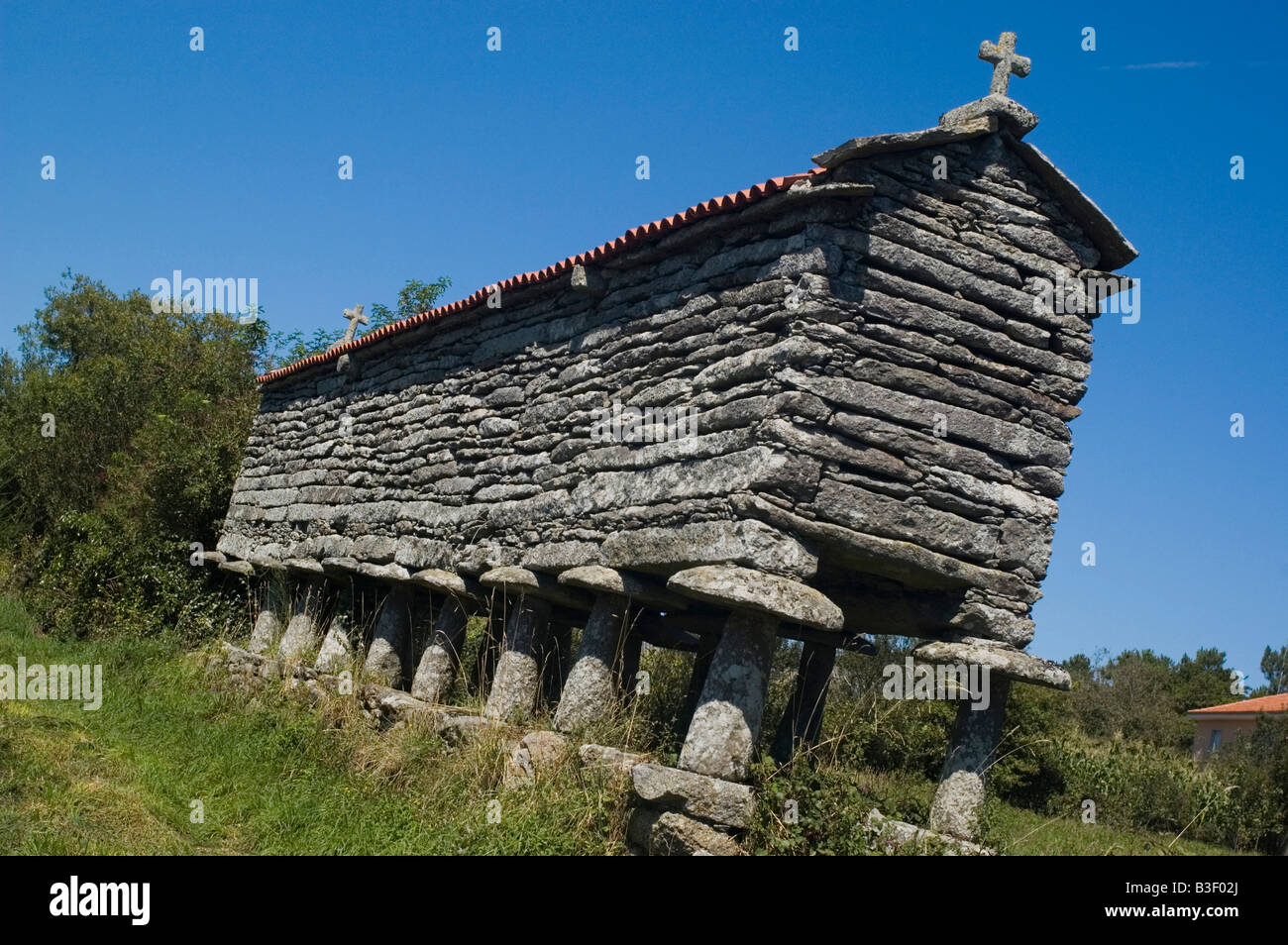 Typical granary called horreo in the village of Olveiroa WAY OF SAINT JAMES or CAMINO DE SANTIAGO in Galicia Spain Stock Photo