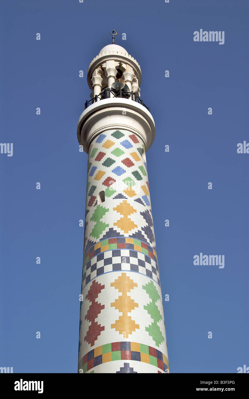 Multi coloured minaret Manama Bahrain Stock Photo
