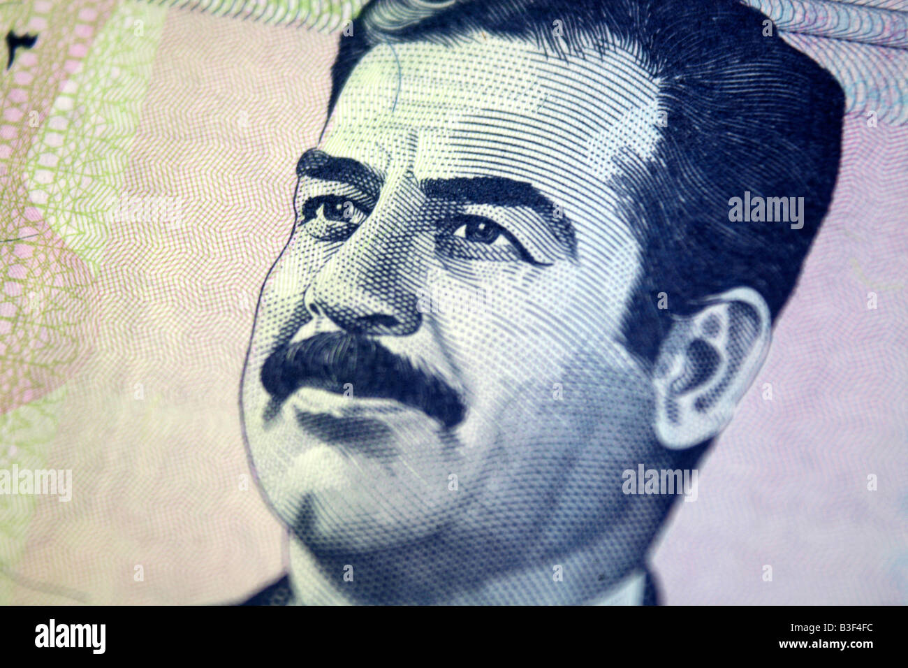 Bank note from Iraq with Portrait of Former Dictator Saddam Hussein Stock Photo