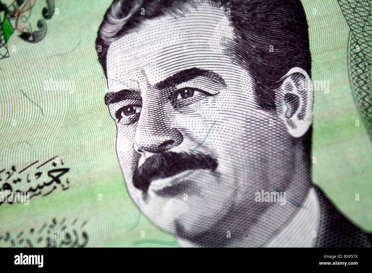 Bank note from Iraq with Portrait of Former Dictator Saddam Hussein Stock Photo