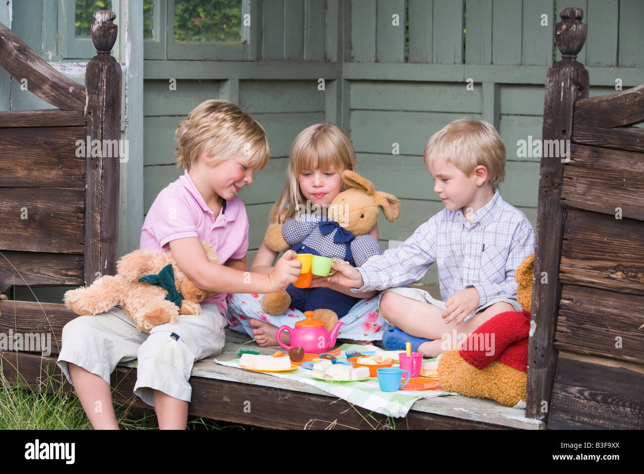 Children children tea party dolls hi-res stock photography and images ...