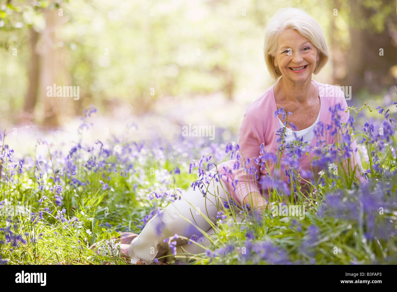 Smiling senior woman spring hi-res stock photography and images - Alamy