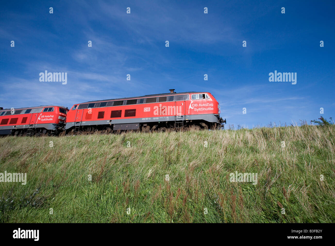 Car train of the Deutsche Bahn AG on the Hindenburgdamm connecting the island of Sylt with the main land Stock Photo