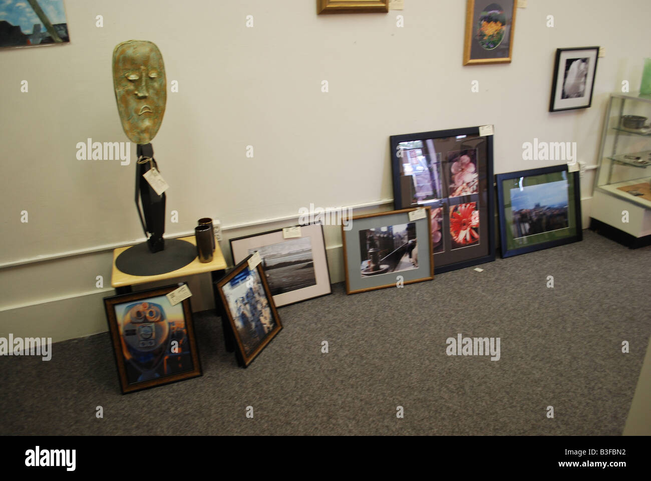 pictures on display in art gallery Stock Photo - Alamy