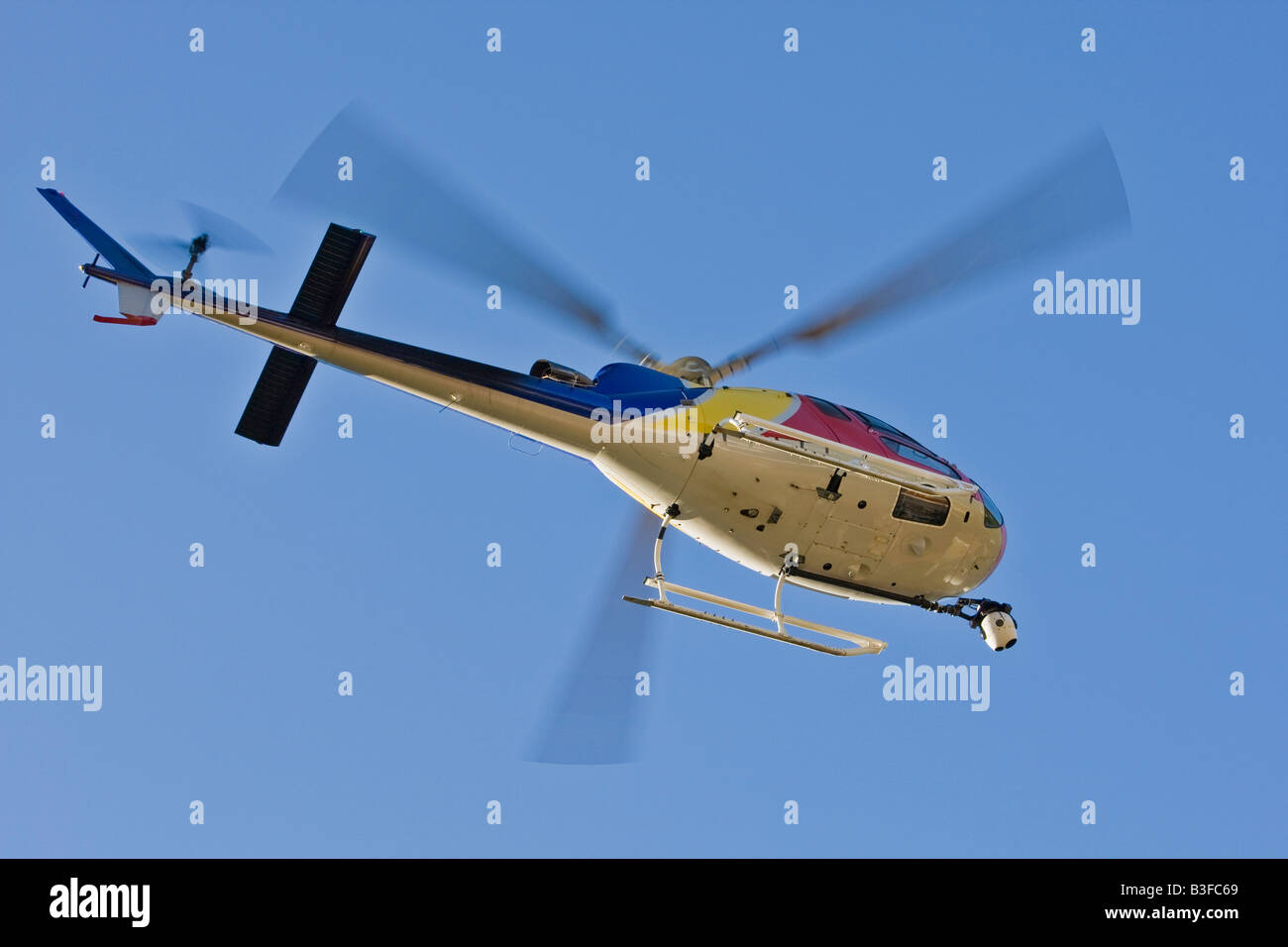 Helicopter with a camera A motion blur on rotor blades Stock Photo Alamy