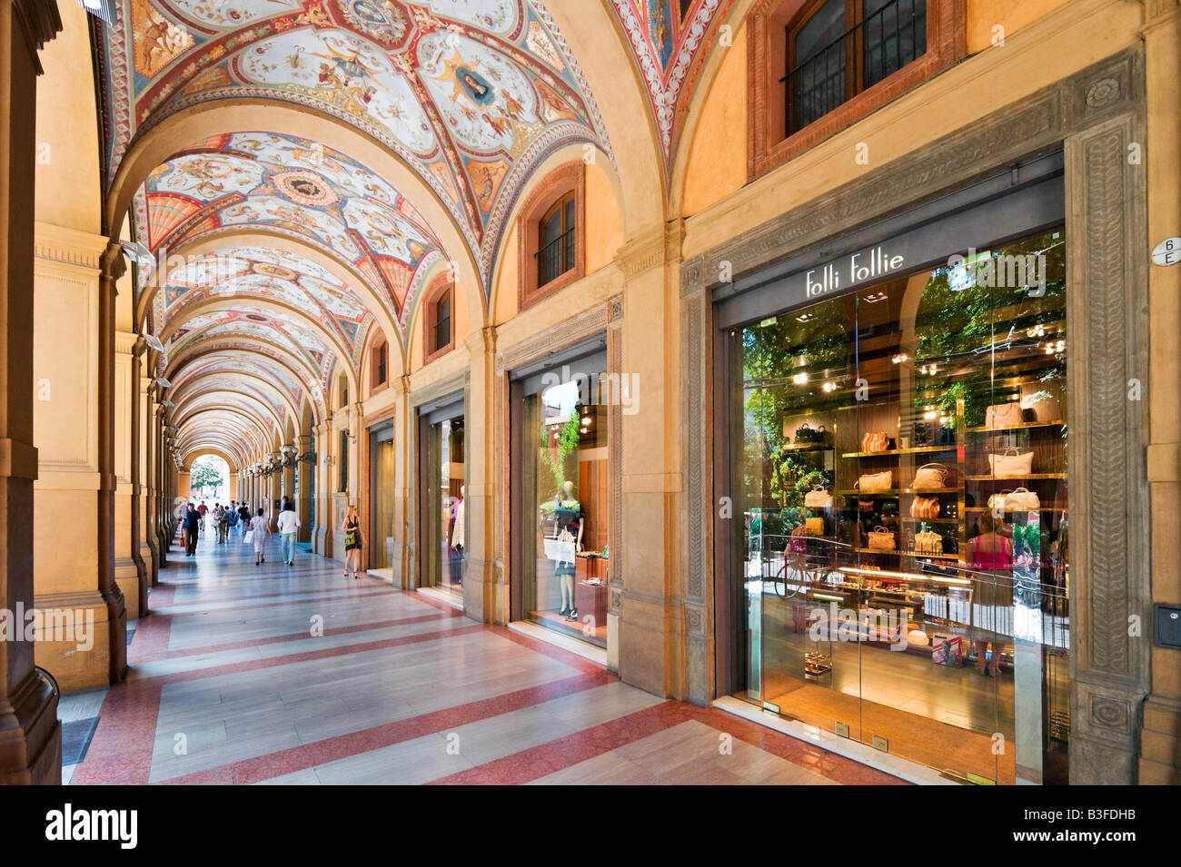 Exclusive shops in a portico on Via Farini in the historic centre, Bologna, Emilia Romagna, Italy Stock Photo