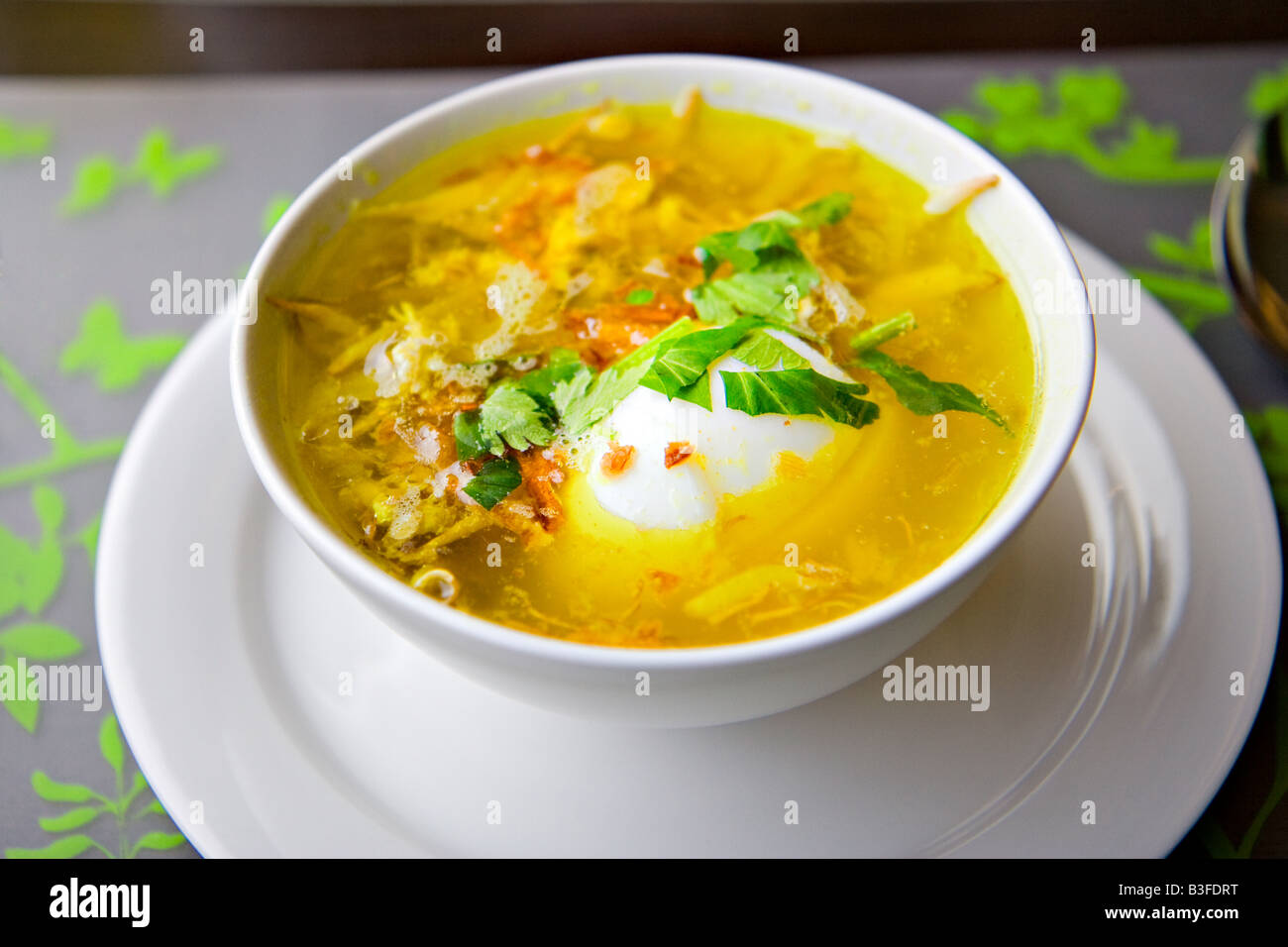 Indonesian Sauto soup a huge bowl filled to the brim Stock Photo - Alamy