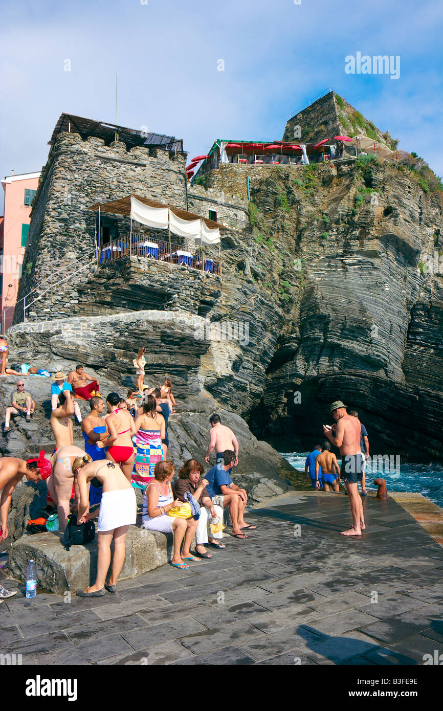 People enjoying summertime  in Vernazza Liturgia Italy. Stock Photo