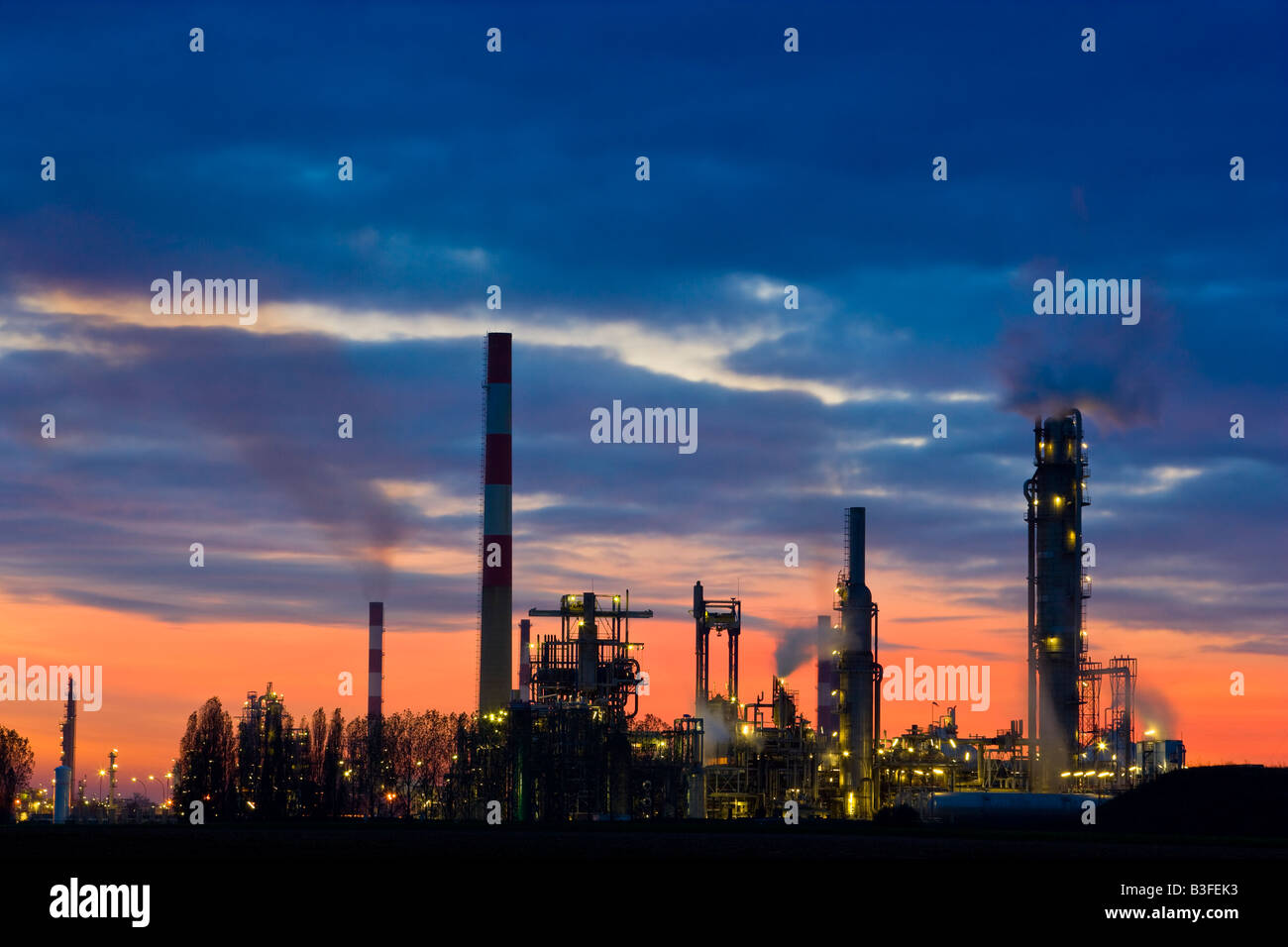 Oil refinery at dusk Stock Photo - Alamy