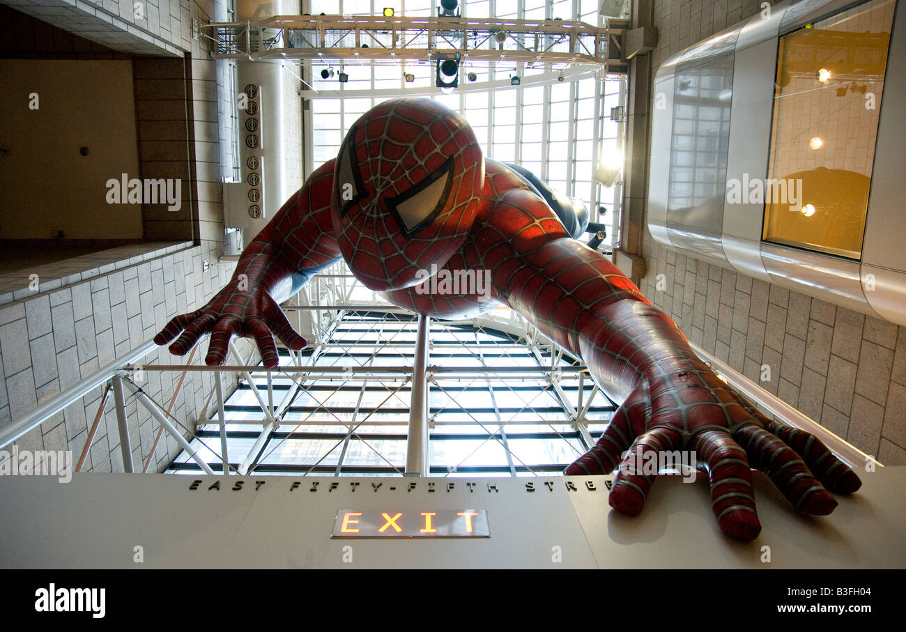 Inflatable Spiderman hanging in Sony Plaza Public Arcade 56th Street and Madison Avenue New York Stock Photo