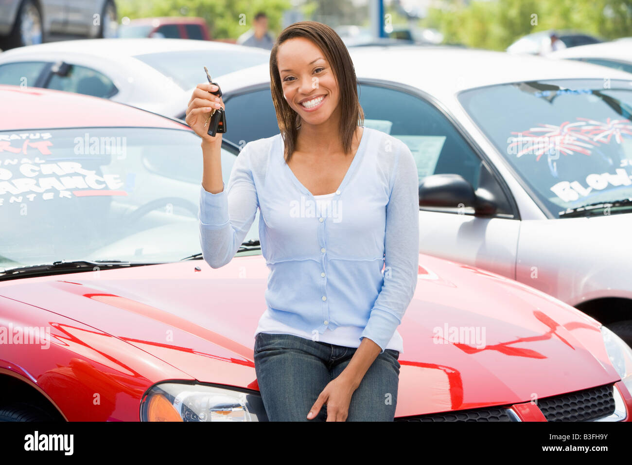 Woman shopping for a new car Stock Photo Alamy
