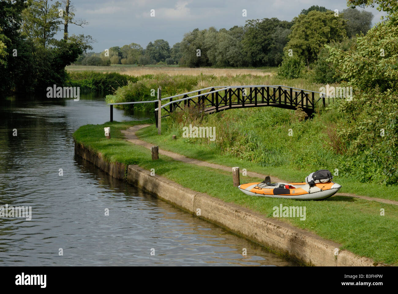 Kayak and gear on bank at Triggs Lock, River Wey Navigation, Surrey, England, Stock Photo