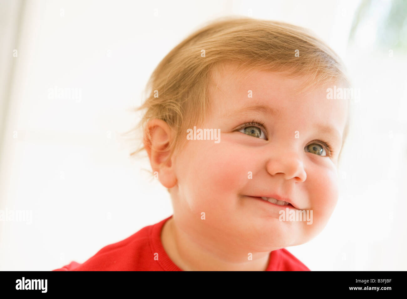 baby-indoors-smiling-stock-photo-alamy