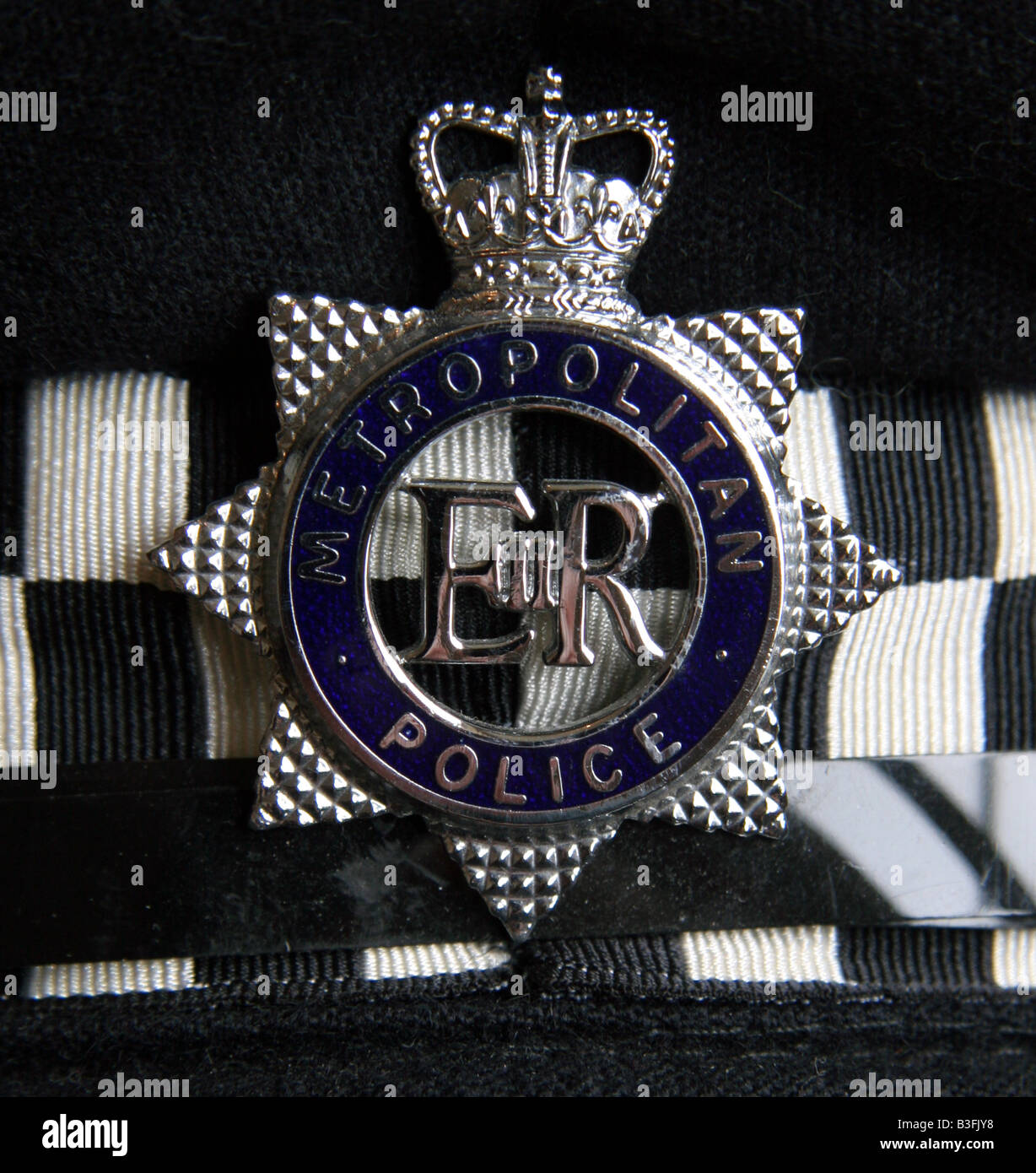 Cap badge of the London Metropolitan Police Stock Photo