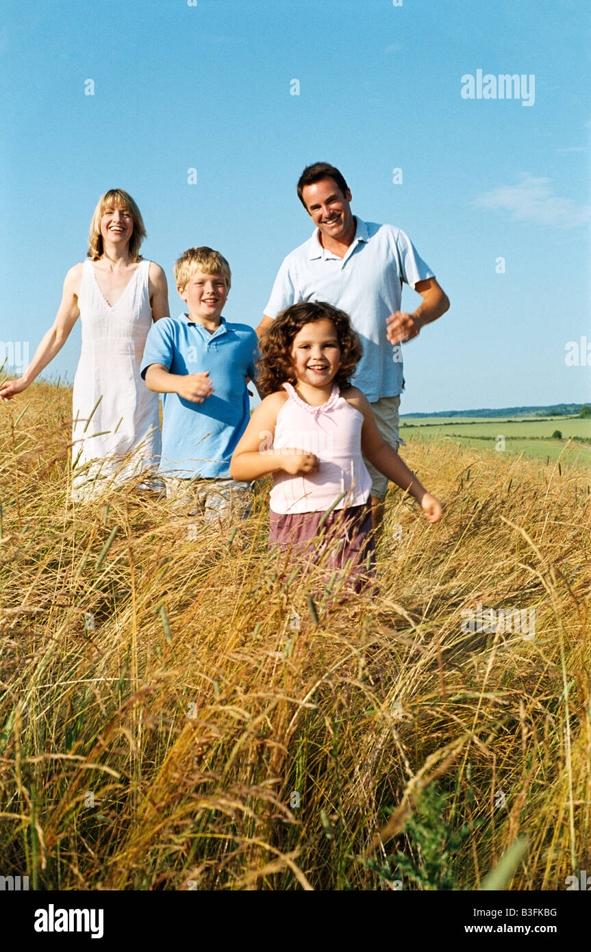 Happy family outdoors hi-res stock photography and images - Alamy