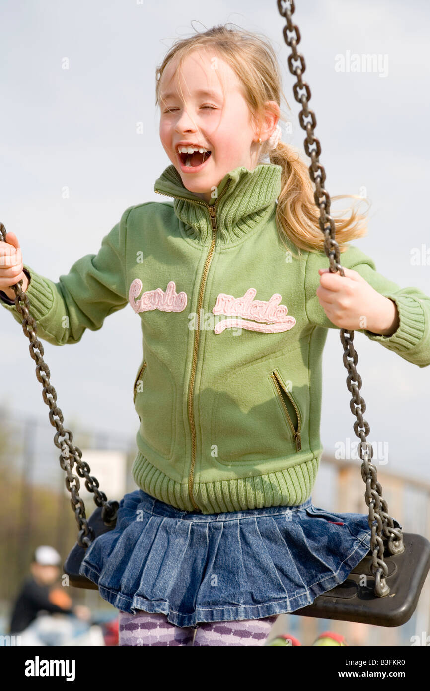 girl swinging Stock Photo