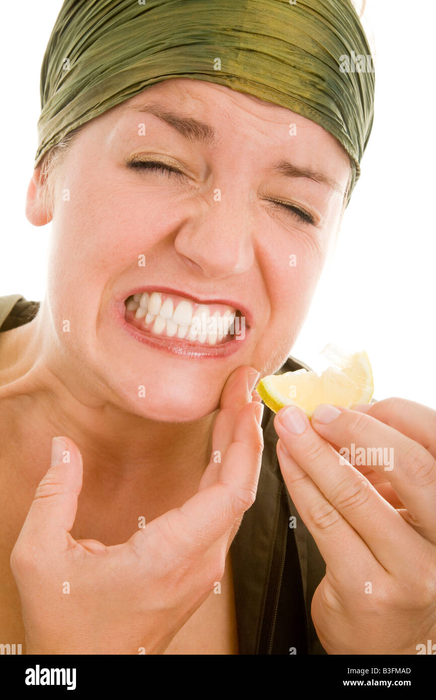 woman with lemon and toothaches Stock Photo