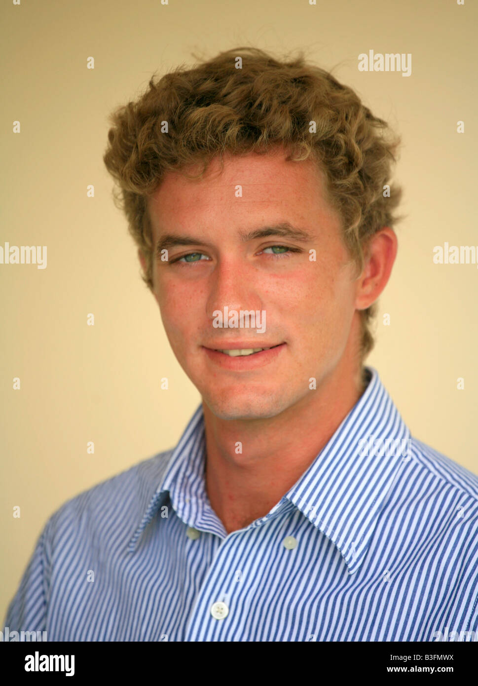 Headshot of young man looking at camera Stock Photo