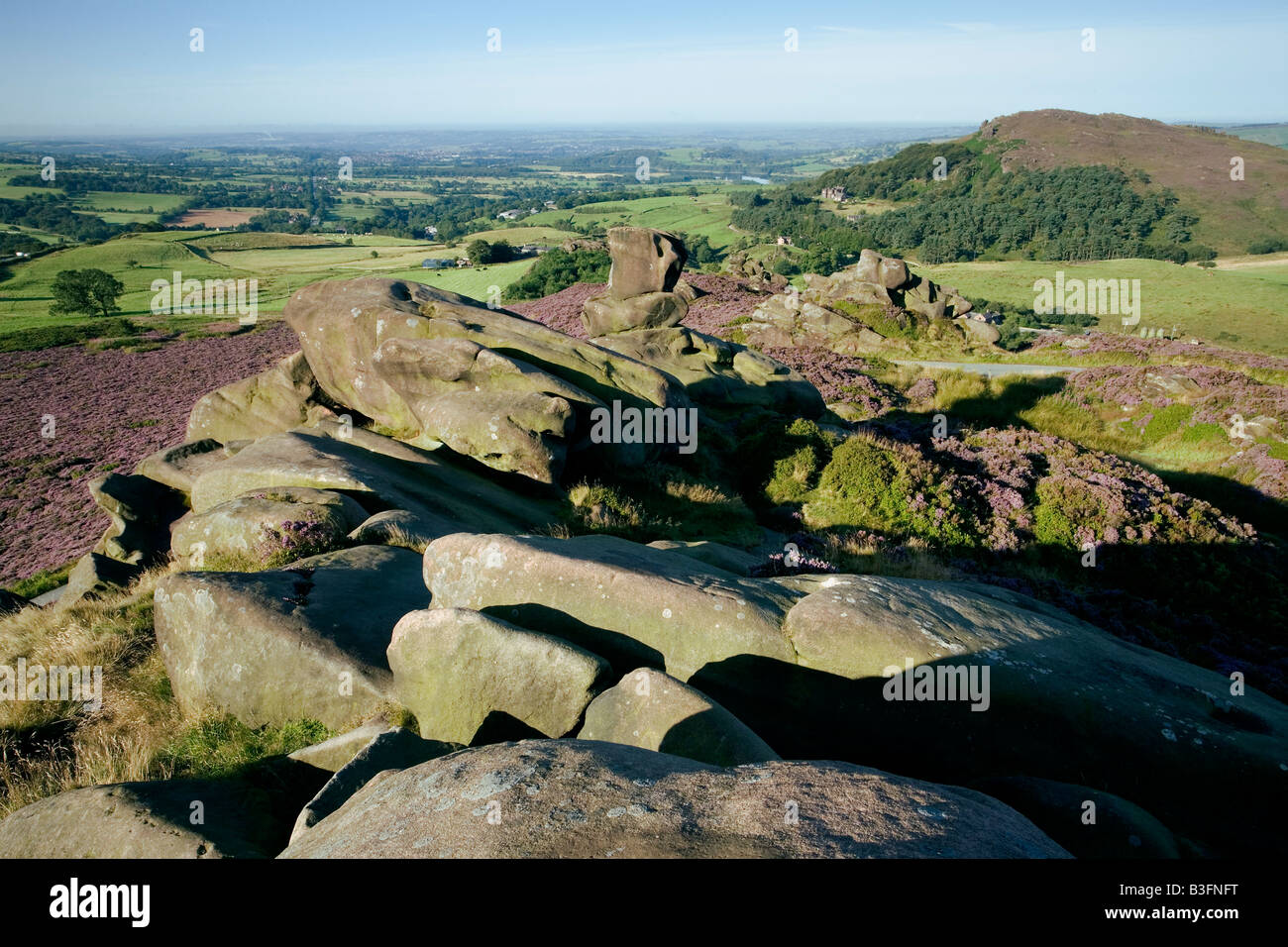 Ramshaw rocks Staffordshire gritstone crags with Hen Cloud in the distance. Stock Photo