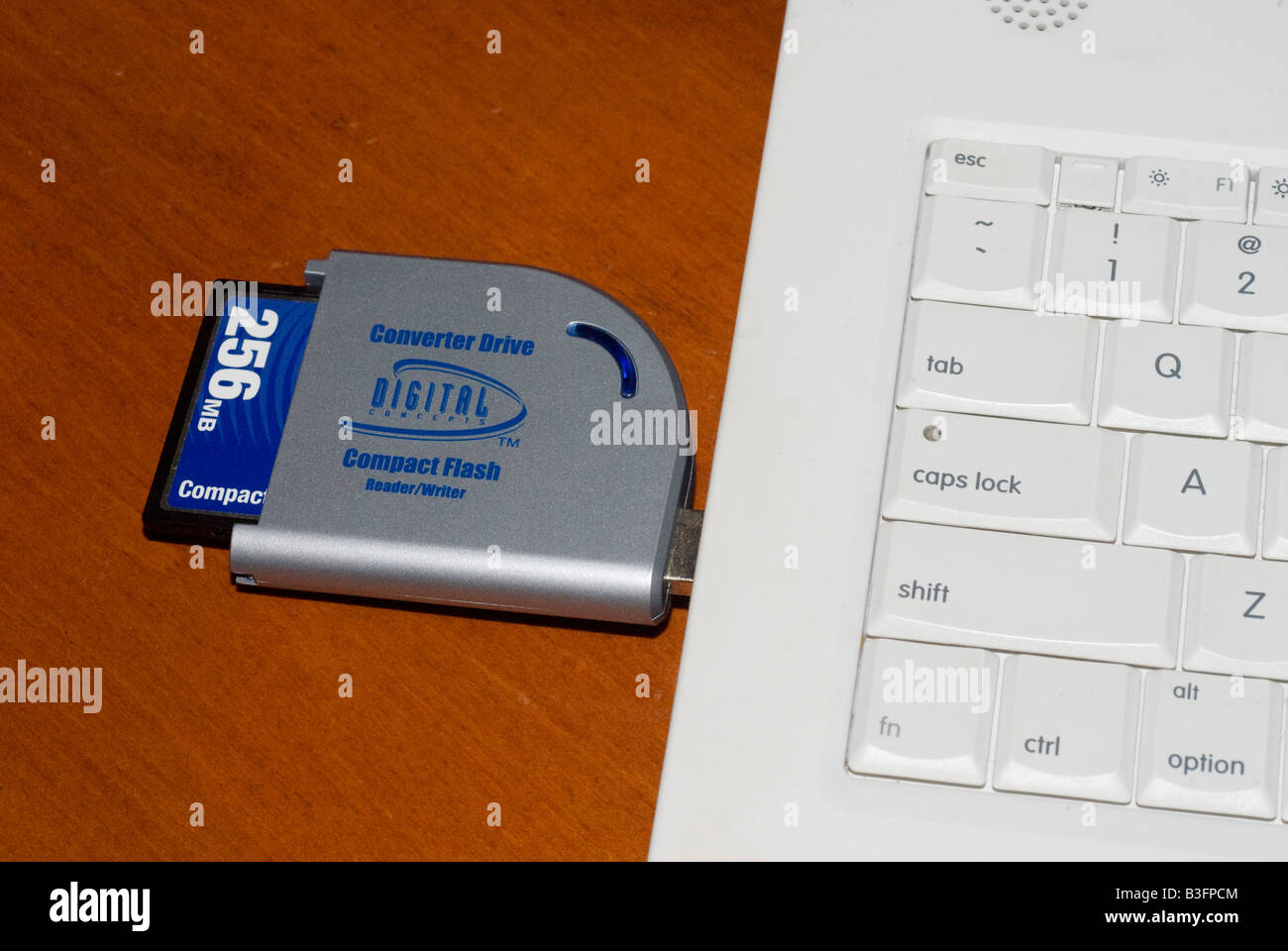 Compact flash memory card in card reader attached to a computer Stock Photo Alamy